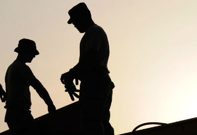 Trabajadores Inmigrantes en una Construccion